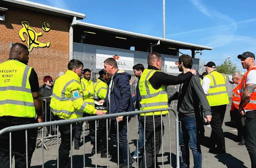 security events company outside football entrance